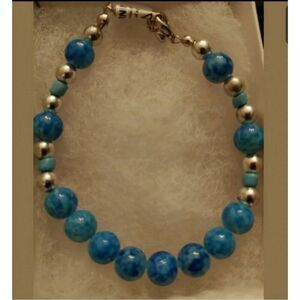 Handmade 7" bracelet Glass Blue bead w/ silver see